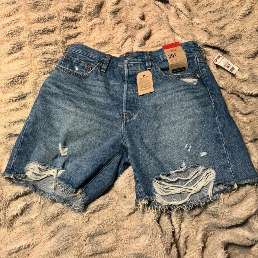 Levi's 501 distressed denim shorts #distresseddenim